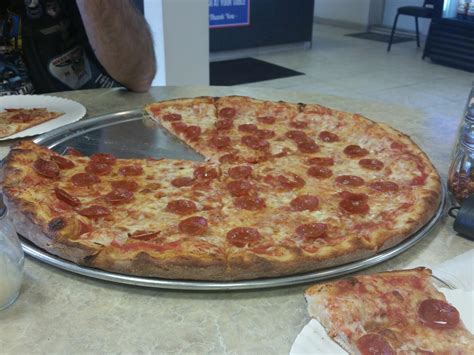 Pizza als - PIZZA Traditional & White $15.00 20" Large 1 8" Medium $14.00 14" Small $9.00 Cheesy Bread $9.00 CALZONES 304-599-9555 192 Jim St Granville,WV $10.95 $8.50 